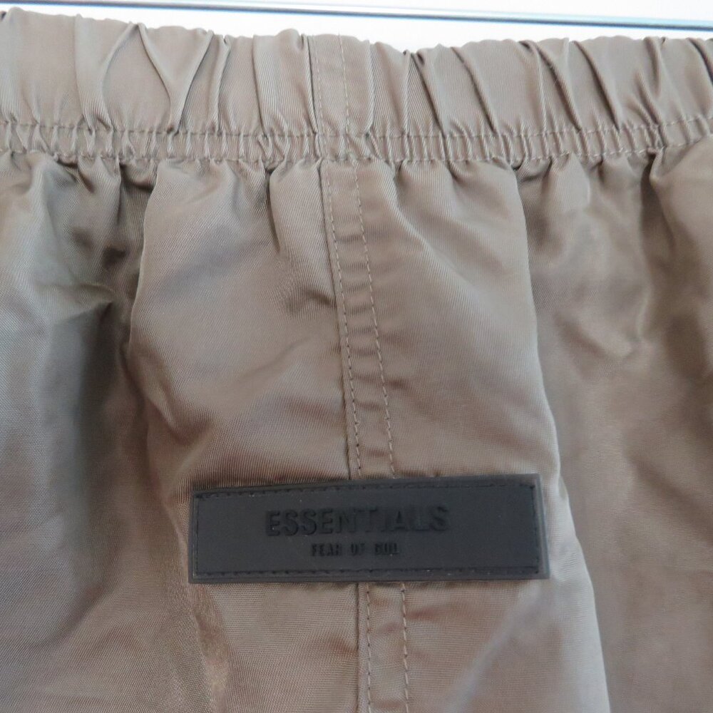 ESSENTIALS FEAR OF GOD Straight Leg Logo Appliquéd Shell Drawstring Shorts Khaki - Picture 2 of 16